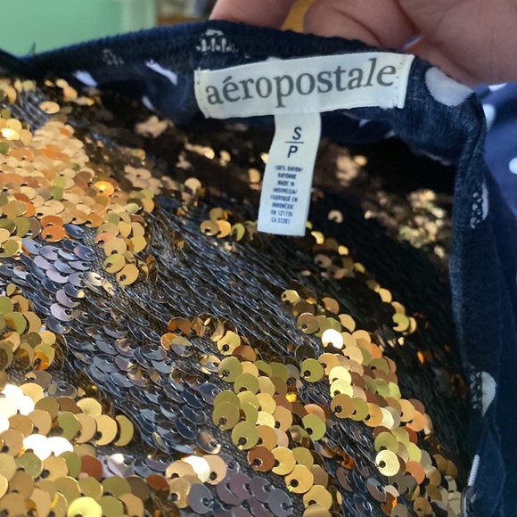 Adorable navy blue and white polkadot mini with Adjustable straps. - Picture 3 of 3